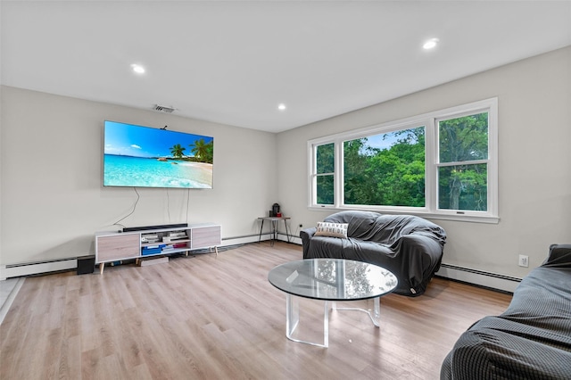 491 Toleman Rd, Rock Tavern, NY 12575 - living room featuring a baseboard radiator, wood finished floors, and recessed lighting