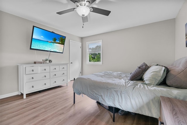 491 Toleman Rd, Rock Tavern, NY 12575 - bedroom with light wood-style flooring, ceiling fan, and baseboards