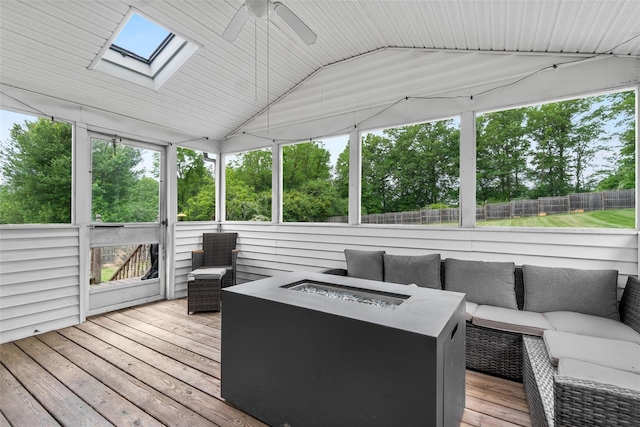 491 Toleman Rd, Rock Tavern, NY 12575 - sunroom with an outdoor living space with a fire pit, ceiling fan, lofted ceiling, and a skylight