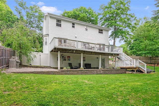 100 Castle Rd, Chappaqua, NY 10514 - back of house featuring a deck, stairs, and a gate