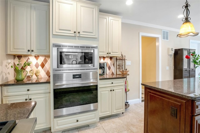 100 Castle Rd, Chappaqua, NY 10514 - kitchen with appliances with stainless steel finishes, decorative backsplash, dark stone counters, pendant lighting, and ornamental molding