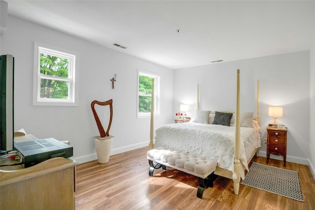 100 Castle Rd, Chappaqua, NY 10514 - bedroom with light wood-style floors and baseboards