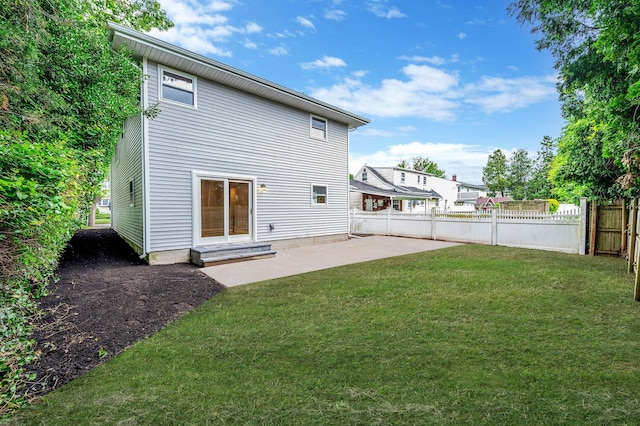 116 Amsterdam Ave, West Babylon, NY 11704 - rear view of house featuring a patio