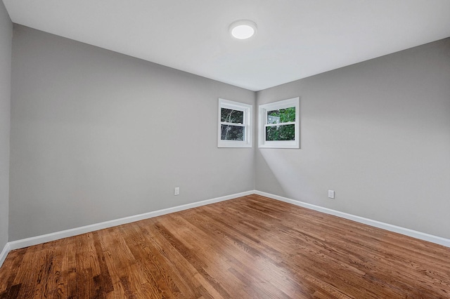 116 Amsterdam Ave, West Babylon, NY 11704 - empty room featuring baseboards and wood finished floors