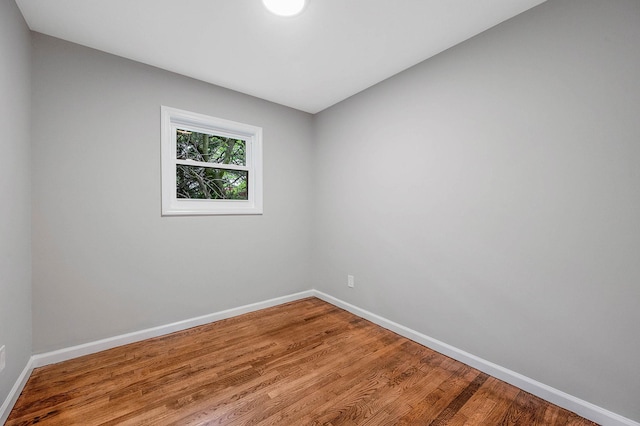 116 Amsterdam Ave, West Babylon, NY 11704 - spare room featuring baseboards and wood finished floors