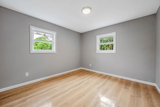 116 Amsterdam Ave, West Babylon, NY 11704 - unfurnished room featuring wood finished floors and baseboards