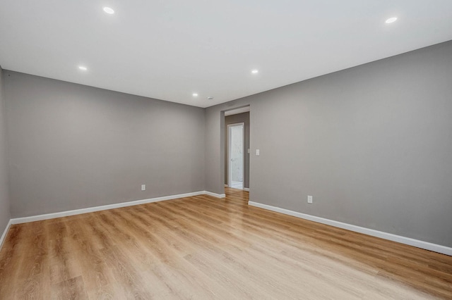 116 Amsterdam Ave, West Babylon, NY 11704 - empty room with recessed lighting, baseboards, and light wood-style flooring