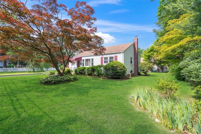 224 Washington Ave, Saint James, NY 11780 - view of side of home featuring a chimney