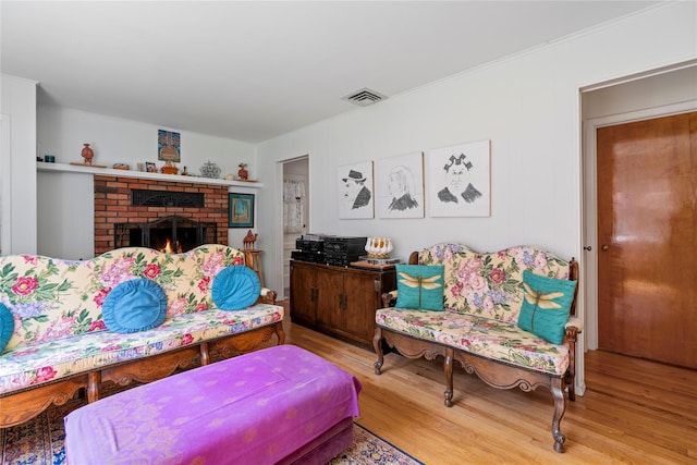 224 Washington Ave, Saint James, NY 11780 - living area with wood finished floors and a fireplace