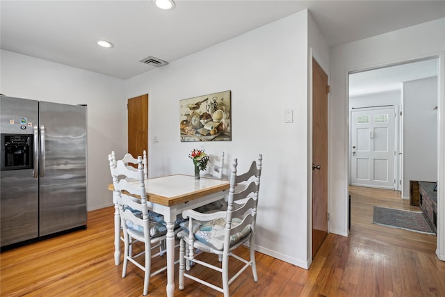 224 Washington Ave, Saint James, NY 11780 - dining room with light wood-style floors, baseboards, and recessed lighting