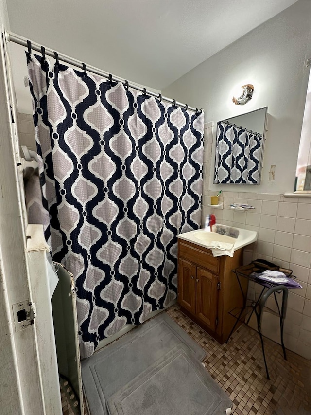 101 Highland Ave Unit 3P, Yonkers, NY 10705 - bathroom with tile walls, vanity, a wainscoted wall, and a shower with curtain