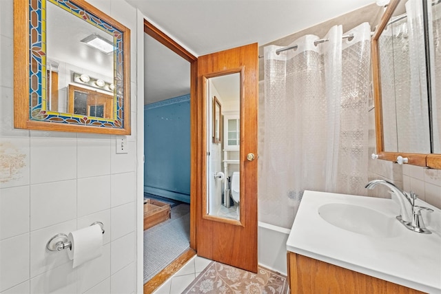 12 Hillside Ter, Amawalk, NY 10501 - full bathroom featuring tile patterned floors, vanity, tile walls, and a shower