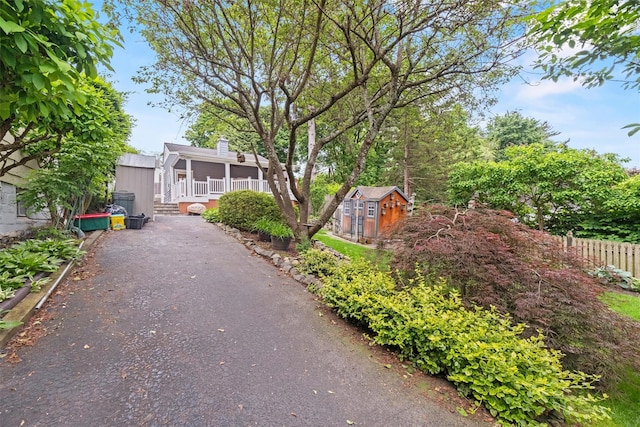 12 Hillside Ter, Amawalk, NY 10501 - view of front of home featuring a chimney and a sunroom