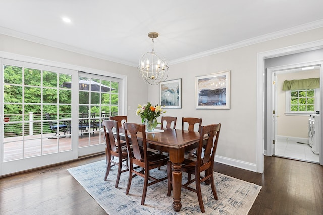 8 Upland Ct, South Salem, NY 10590 - dining space with plenty of natural light, a chandelier, baseboards, ornamental molding, and dark wood-style flooring