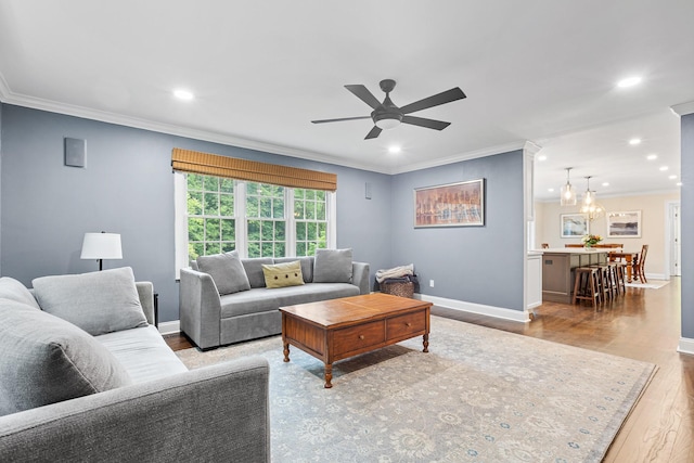 8 Upland Ct, South Salem, NY 10590 - living room with recessed lighting, wood finished floors, baseboards, a ceiling fan, and crown molding