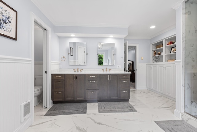8 Upland Ct, South Salem, NY 10590 - bathroom featuring a wainscoted wall, double vanity, ornamental molding, heating unit, and marble finish flooring
