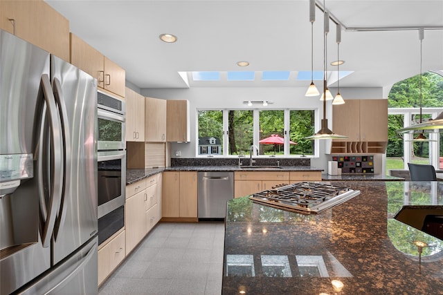 109 Sleight Plass Rd, Poughkeepsie, NY 12603 - kitchen featuring appliances with stainless steel finishes, light brown cabinetry, plenty of natural light, and recessed lighting