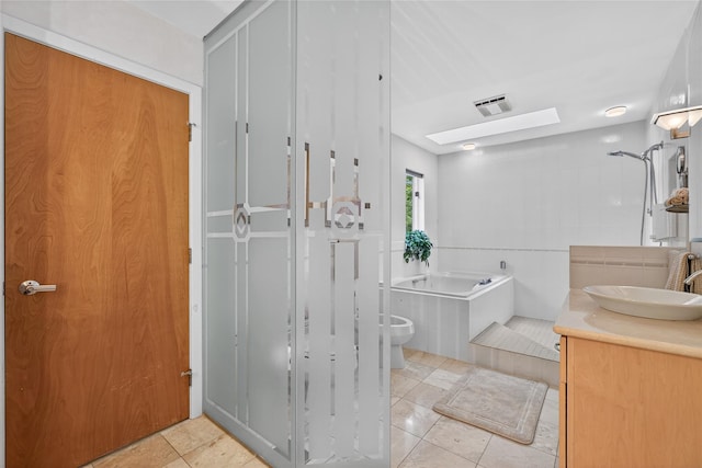 109 Sleight Plass Rd, Poughkeepsie, NY 12603 - full bathroom featuring a skylight, tiled shower, a garden tub, tile patterned flooring, and vanity