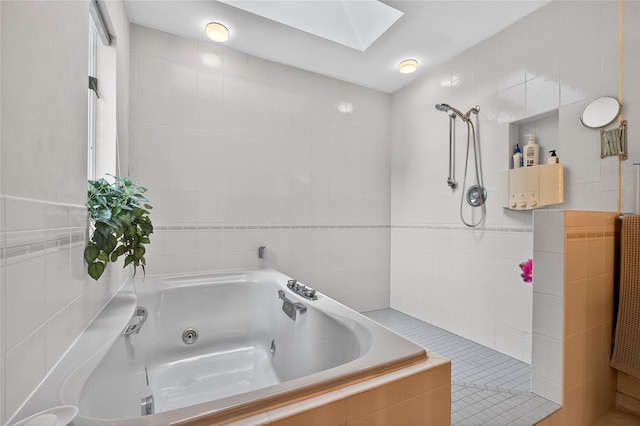 109 Sleight Plass Rd, Poughkeepsie, NY 12603 - full bath with a tub with jets, a tile shower, a skylight, and tile walls
