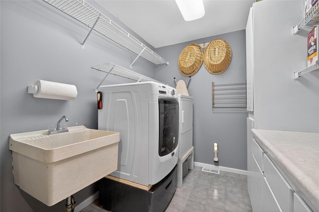 109 Sleight Plass Rd, Poughkeepsie, NY 12603 - laundry room with washer and clothes dryer and cabinet space