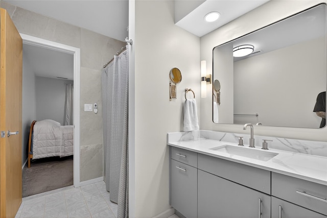 109 Sleight Plass Rd, Poughkeepsie, NY 12603 - full bathroom with marble finish flooring, vanity, connected bathroom, and a shower with curtain