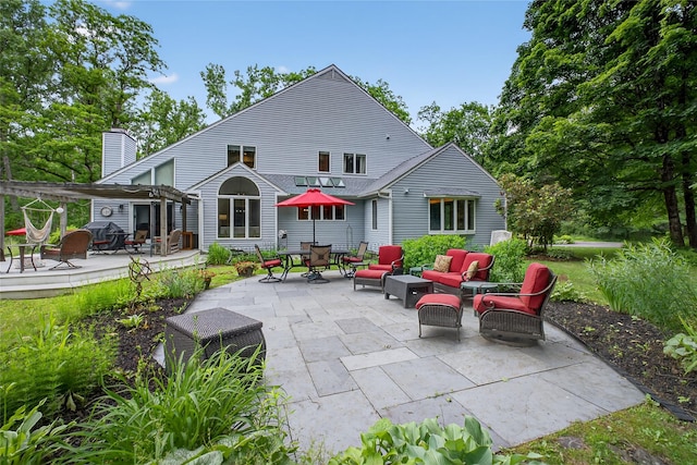 109 Sleight Plass Rd, Poughkeepsie, NY 12603 - rear view of property featuring an outdoor hangout area, a patio area, outdoor dining area, and a deck