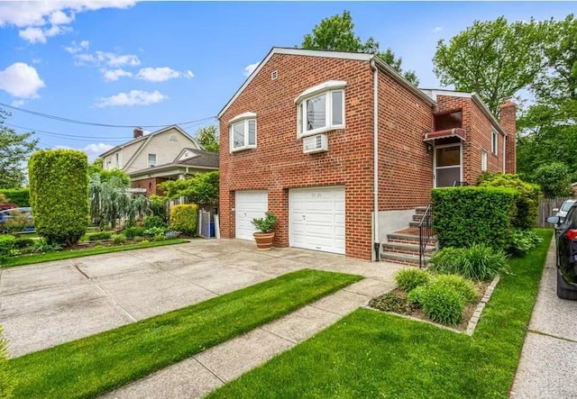 3226 165th St, Flushing, NY 11358 - view of front of property with an attached garage, brick siding, driveway, and an AC wall unit