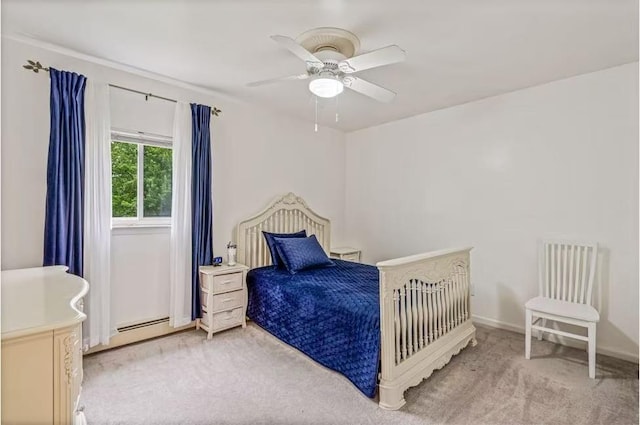3226 165th St, Flushing, NY 11358 - bedroom with light carpet, baseboards, and a ceiling fan
