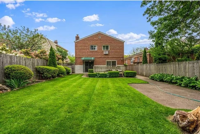 3226 165th St, Flushing, NY 11358 - rear view of property with brick siding