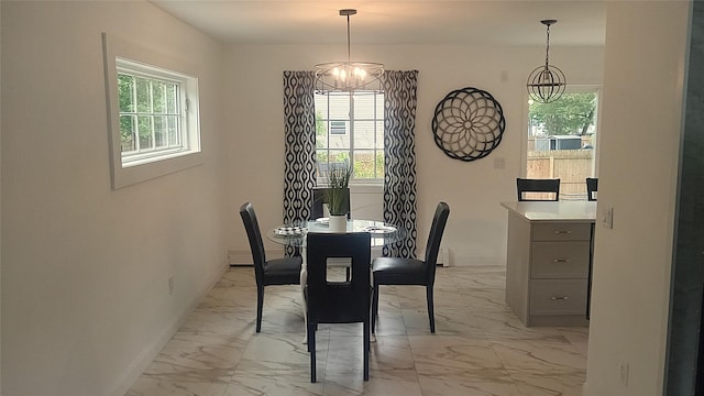 34 Park Ln, Medford, NY 11763 - dining room featuring light marble finish flooring, plenty of natural light, and baseboards