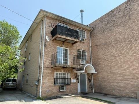 9317 197th St, Hollis, NY 11423 - photo 1