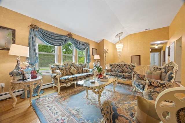 550 Saw Mill River Rd, Millwood, NY 10546 - living area featuring wood finished floors, vaulted ceiling, and a baseboard heating unit
