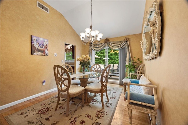 550 Saw Mill River Rd, Millwood, NY 10546 - dining room featuring a chandelier, light wood-style floors, baseboards, and high vaulted ceiling