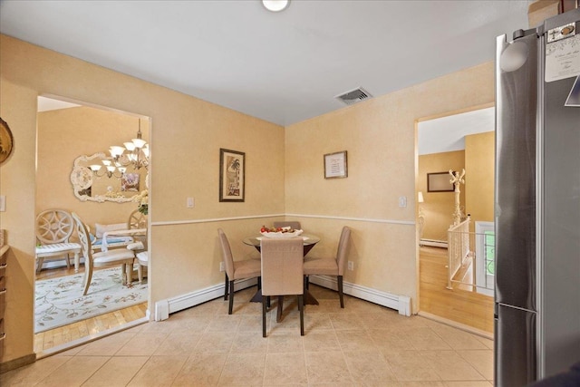550 Saw Mill River Rd, Millwood, NY 10546 - dining area featuring a baseboard heating unit and light tile patterned floors