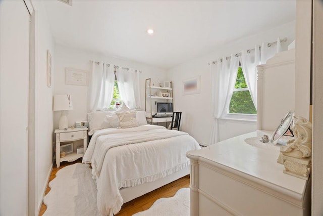 550 Saw Mill River Rd, Millwood, NY 10546 - bedroom featuring multiple windows, light wood-style flooring, and recessed lighting