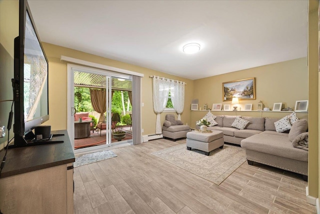 550 Saw Mill River Rd, Millwood, NY 10546 - living room featuring baseboard heating and light wood-type flooring