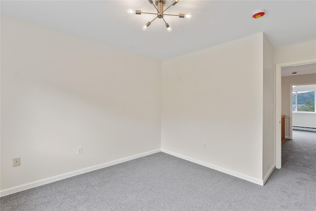 221 Tamerisk Ln, New Windsor, NY 12553 - spare room with a chandelier, a baseboard heating unit, baseboards, and carpet floors