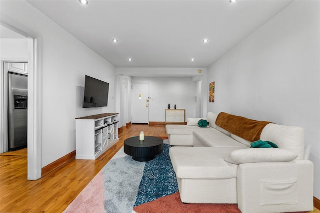59-30 108th St Unit 6K, Corona, NY 11368 - living room featuring light wood-type flooring, baseboards, and recessed lighting
