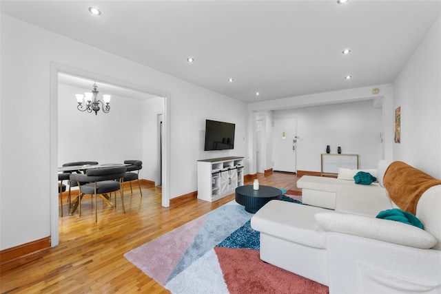 59-30 108th St Unit 6K, Corona, NY 11368 - living room with light wood-type flooring, recessed lighting, a chandelier, and baseboards