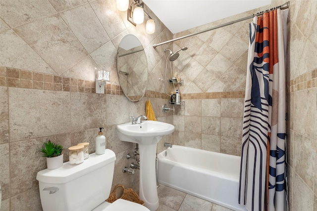 59-30 108th St Unit 6K, Corona, NY 11368 - full bathroom with toilet, tile walls, shower / bath combo, and a sink