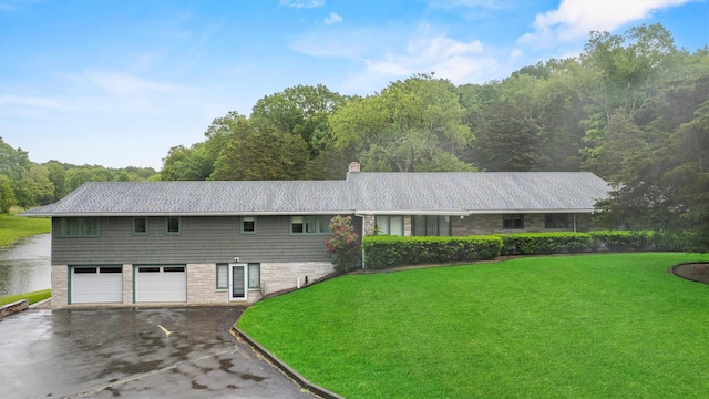 736 State Route 94 N, Warwick, NY 10990 - view of front of home with driveway, a front yard, an attached garage, and a chimney