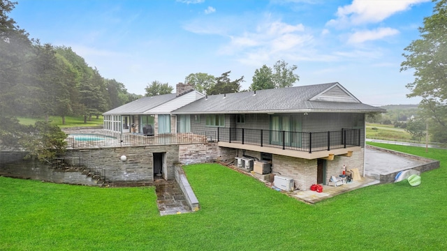736 State Route 94 N, Warwick, NY 10990 - back of property featuring a yard, a chimney, a pool, and a balcony