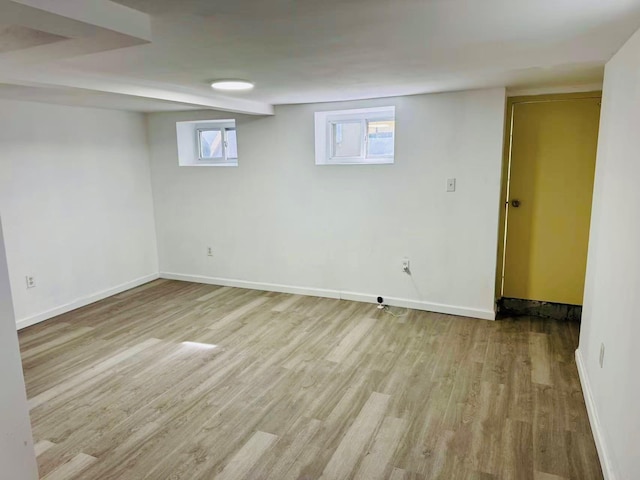 1372 E 94th St, Brooklyn, NY 11236 - basement featuring wood finished floors, baseboards, and plenty of natural light