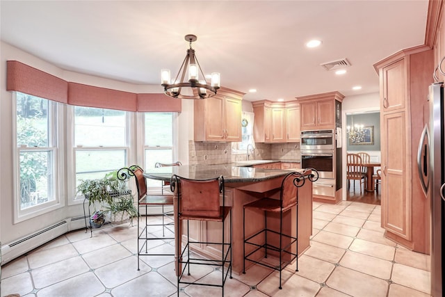 285 Willow Grove Rd, Stony Point, NY 10980 - kitchen with stainless steel appliances, a chandelier, a sink, healthy amount of natural light, and recessed lighting