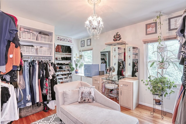 285 Willow Grove Rd, Stony Point, NY 10980 - spacious closet with light wood-type flooring and a chandelier