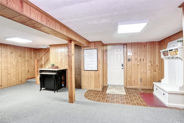 285 Willow Grove Rd, Stony Point, NY 10980 - finished below grade area featuring wood walls, stairway, baseboards, and carpet