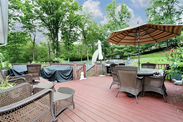285 Willow Grove Rd, Stony Point, NY 10980 - wooden terrace featuring outdoor dining area and view of wooded area