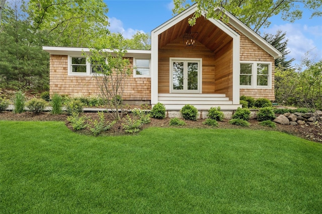 69 Bay View Dr W, Sag Harbor, NY 11963 - view of front of house with a front yard