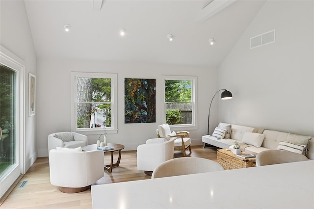69 Bay View Dr W, Sag Harbor, NY 11963 - living area featuring light wood finished floors and high vaulted ceiling