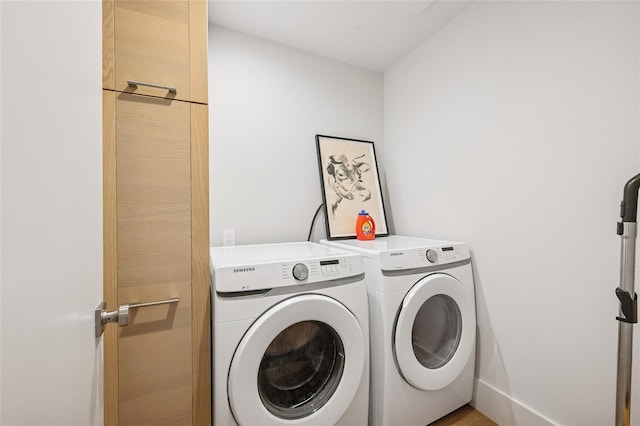 69 Bay View Dr W, Sag Harbor, NY 11963 - laundry room with washing machine and clothes dryer